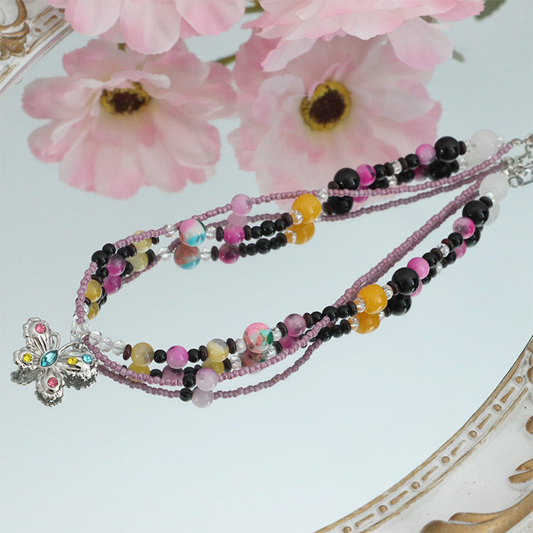 Hochwertige handgefertigte Halskette aus Reisperlen und Naturstein