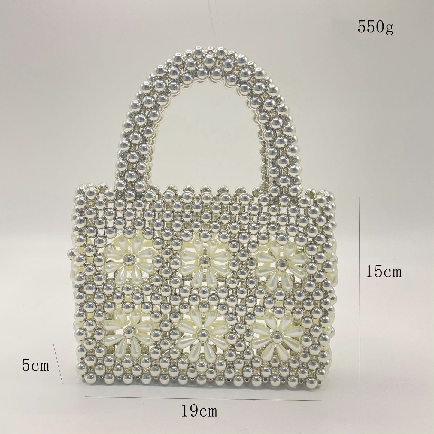 Bolso de mano con flores y cuentas hecho a mano