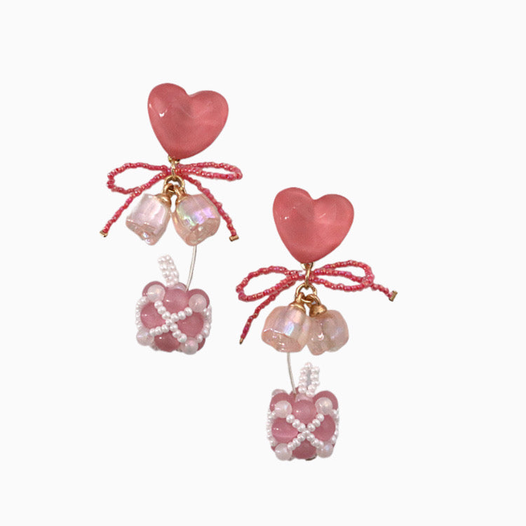 Adorables pendientes de cuentas con forma de ojo de gato y corazón rosa en plata de ley