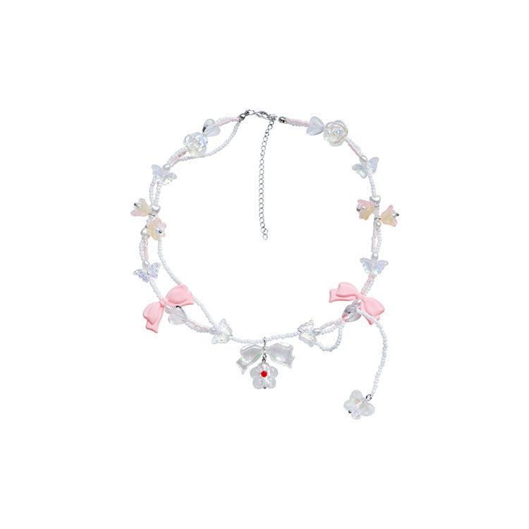 Collar hecho a mano con cuentas de cristal y perlas brillantes con lazo de mariposa