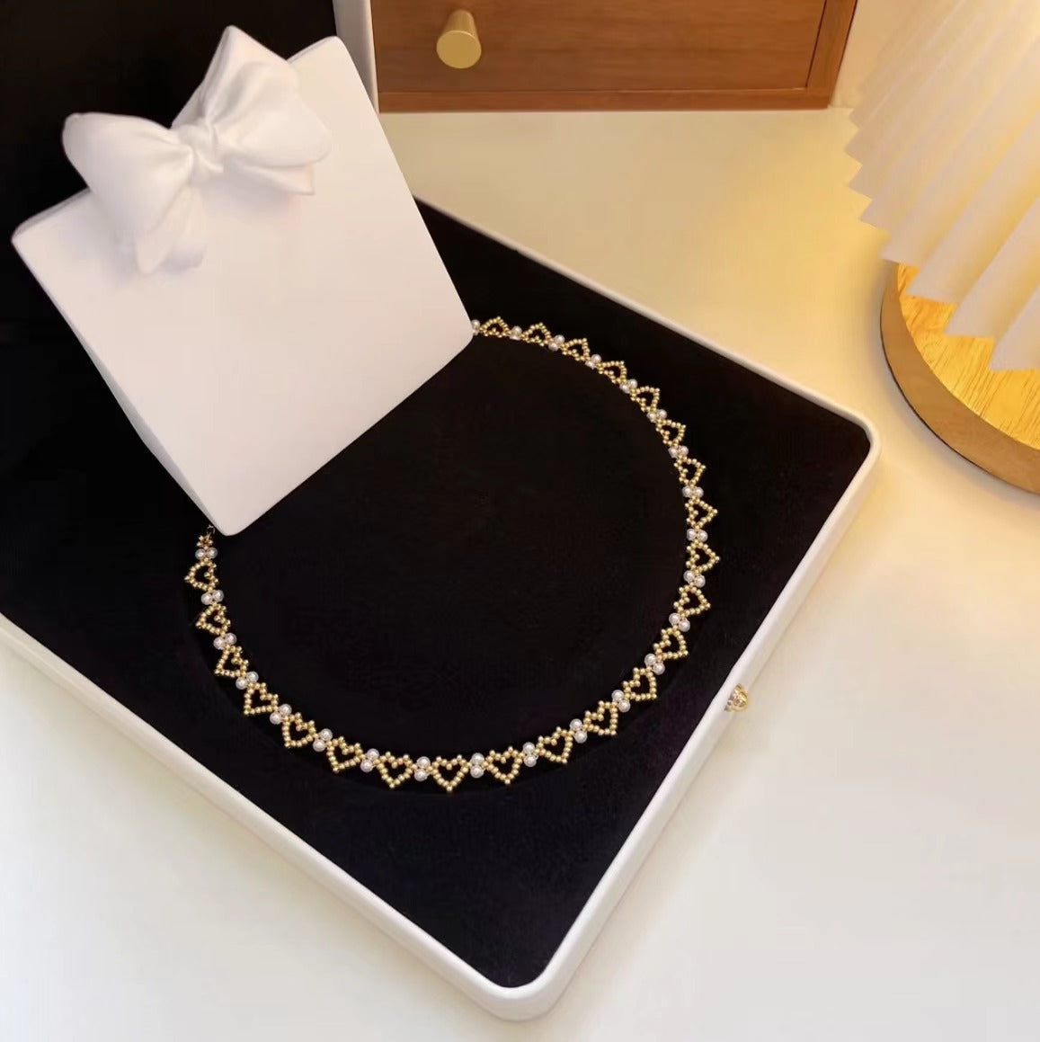 Collar de perlas hecho a mano con cuentas en forma de corazón