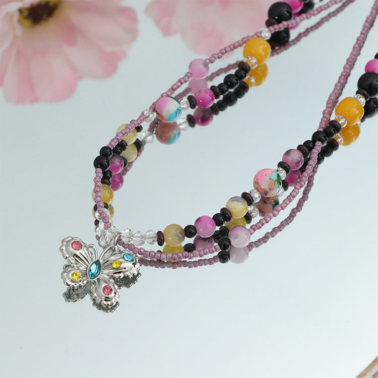 Hochwertige handgefertigte Halskette aus Reisperlen und Naturstein