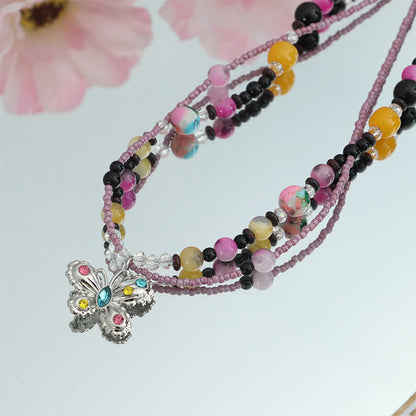 Hochwertige handgefertigte Halskette aus Reisperlen und Naturstein