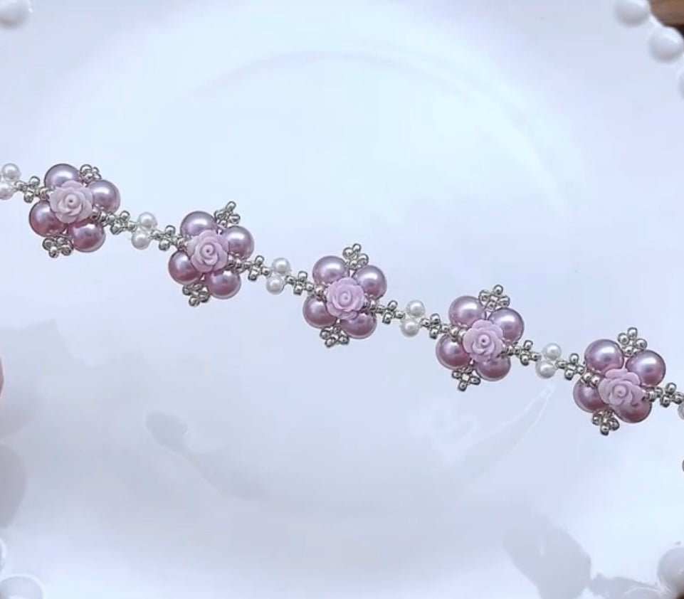 Pulsera hecha a mano con perla de color rosa violeta
