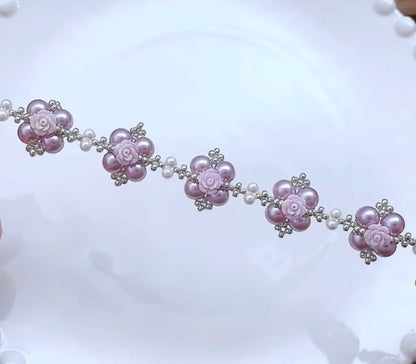Pulsera hecha a mano con perla de color rosa violeta