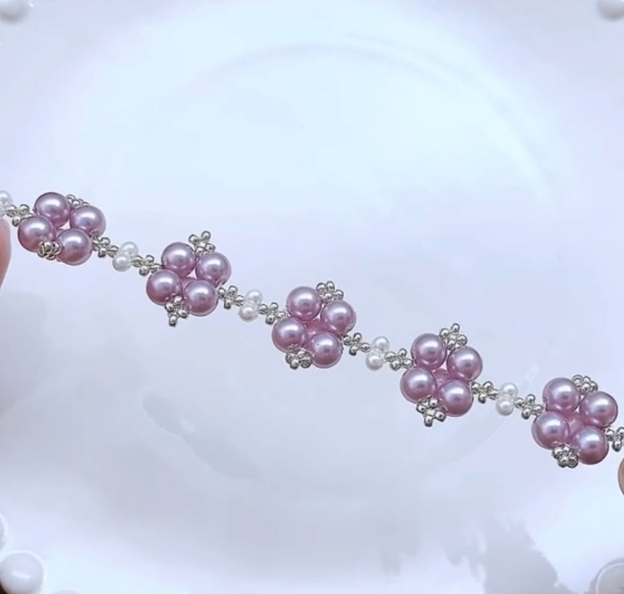 Pulsera hecha a mano con perla de color rosa violeta