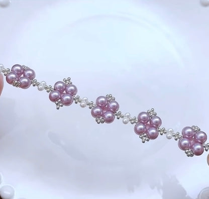 Pulsera hecha a mano con perla de color rosa violeta