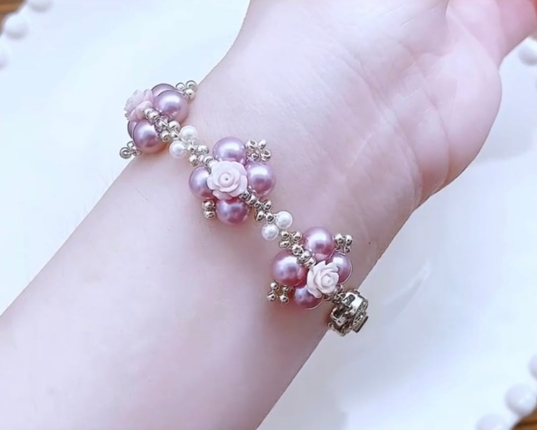 Pulsera hecha a mano con perla de color rosa violeta