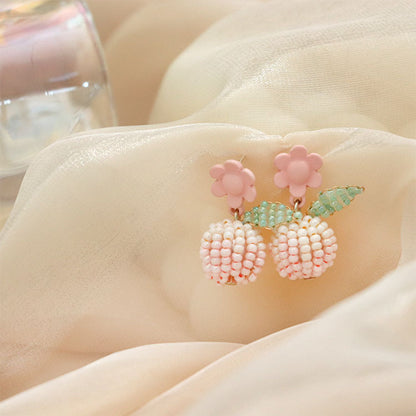 Pendientes de cuentas de semillas hechos a mano con flor rosa y aguja de plata 