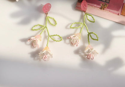 Pendientes de plata de ley hechos a mano con cuentas de flores 